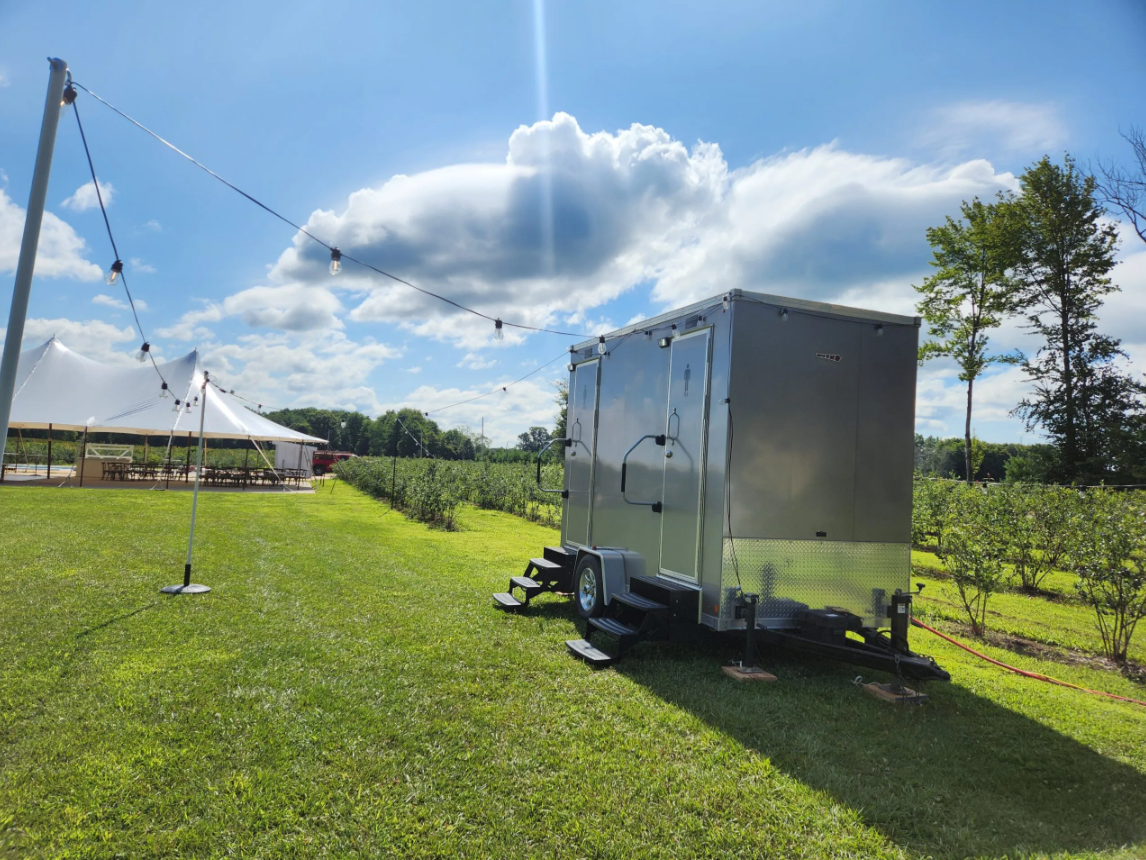 Luxury restroom trailers for vineyard events in Grand Beach, Michigan